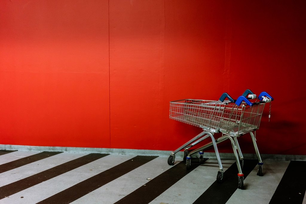 Shopping trolleys red wall